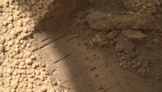 Illustration for article titled Mystery Particles on Mars Revealed by Curiosity's Junk